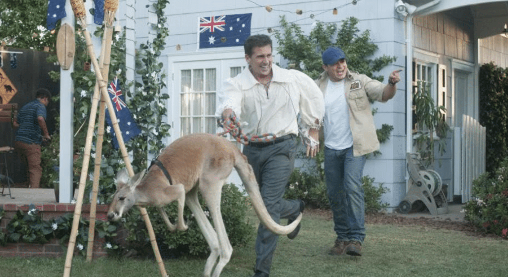 a man running with a kangaroo